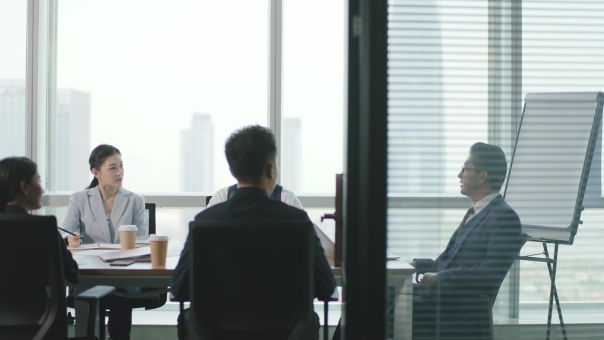 Group of asian business people meeting in modern office conference room | Shutterstock HD Video #1056147308