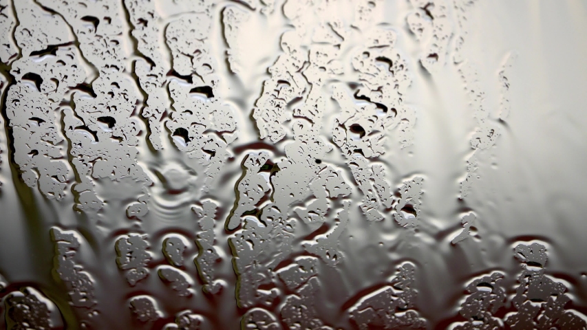 rain drops on clear window Royalty-Free Stock Footage #1056150230