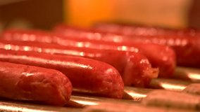 video of sausages cooking sausages rotation