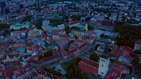 Amazing aerial drone shot of old town of Tallinn, Estonia at sunset. Beautiful Estonia.