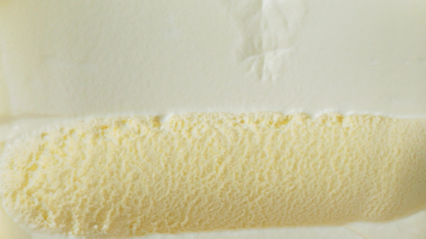 Scooping ice cream Vanilla Top view. | Shutterstock HD Video #1056158990