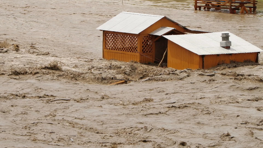 Flooding, River overflowing, Ecological disaster, Global warming problem | Shutterstock HD Video #1056166925