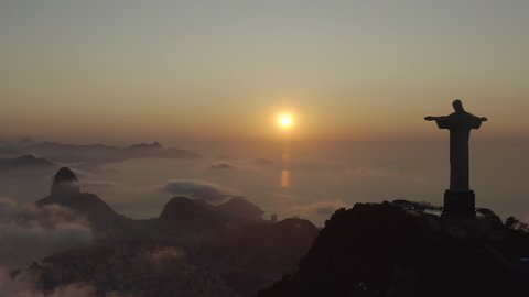 Rio de Janeiro/Brazil - January 25th, 2020: Aerial footage of Christ the Redeemer during sunrise over Corcovado Mountain