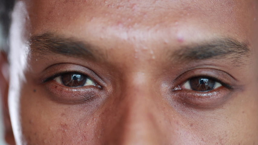 Macro african american man eyes close-up. Black person opening eyes smiling | Shutterstock HD Video #1056178208