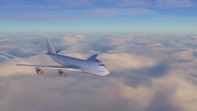 Big jet airplane flying over the sky in beautiful sunrise light. Aerial view of plane above the clouds. Footage in 4K, 16 bit depth