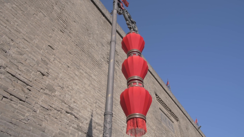 Traditional red lanterns and City Wall, Xi
