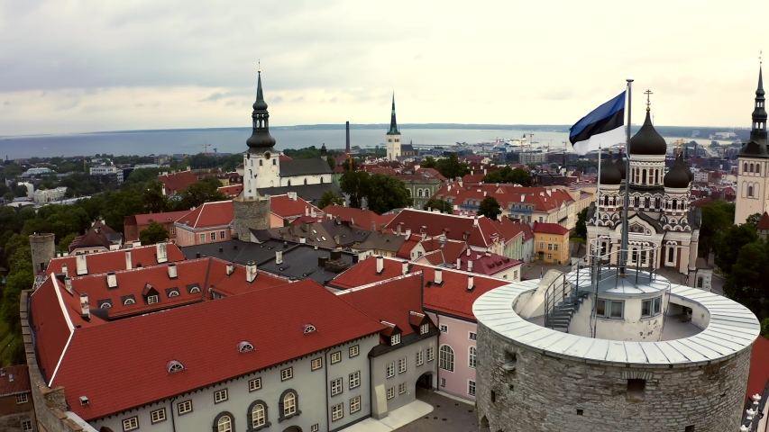 Estonian flag in the wind over the old city of Tallinn.