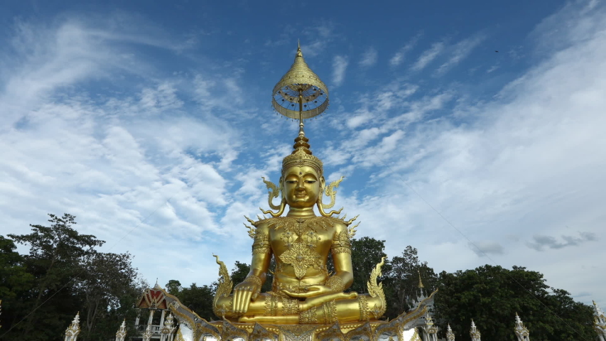 Time-lapse Golden buddha and Beautiful sky