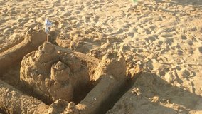 video of sandcastle under sunlight