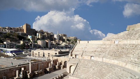 Roman Theatre against the background of moving clouds in Amman, Jordan -- theatre was built the reign of Antonius Pius (138-161 CE), the large and steeply raked structure could seat about 6000 people