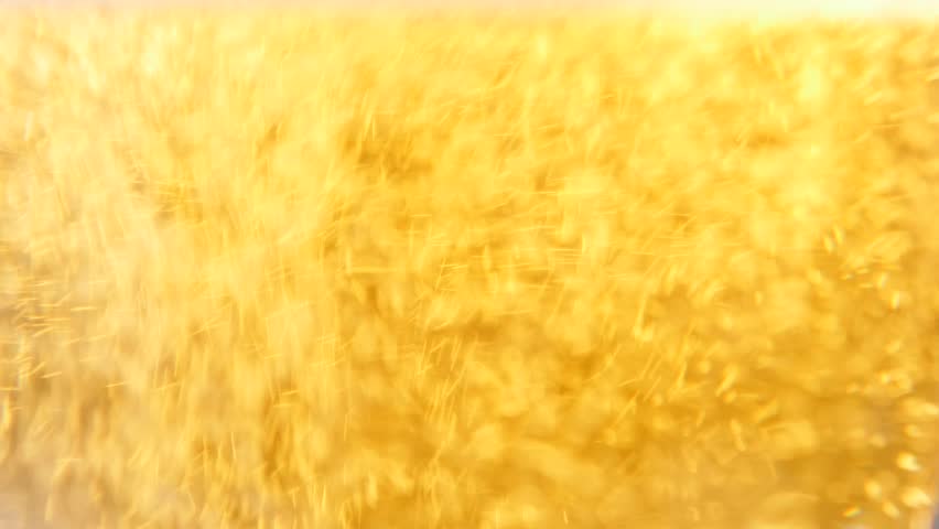 Glass full of beer slow moving bubbles 4K 3840X2160 UltraHD footage - Bubbles and foam moving fast in glass of beer 4K 2160p UHD video Royalty-Free Stock Footage #10562576