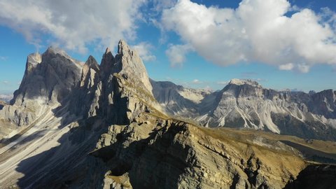 Amazing view on Seceda peak. Trentino Alto Adige, Dolomites Alps, South Tyrol, Italy, Europe. Odle mountain range, Val Gardena. Majestic Furchetta peak in the sunlight. Dolomiti, Italy.