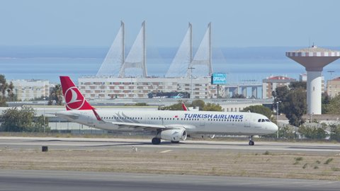 LISBON, PORTUGAL - 2020: Turkish Airlines Airbus A321 Jet Airliner Taxiing at Lisbon Portugal Humberto Delgado Portela International Airport Ground on a Blue Sky Sunny Day