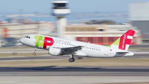 LISBON, PORTUGAL - 2020: TAP Air Portugal Airbus A319 Jet Airliner Taking Off Departing Lisbon Portugal Humberto Delgado Portela International Airport Runway Flying into a Blue Sky on a Sunny Day