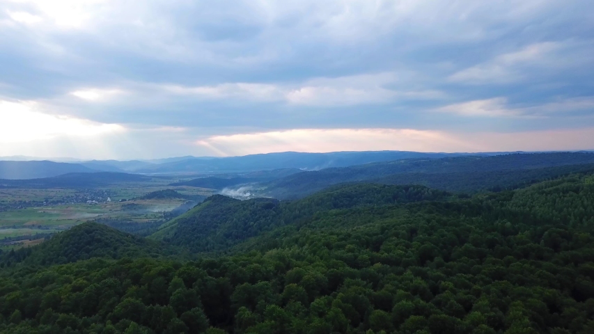 Beautiful drone panoramic view of green forest in the mountains. Summer day. 4k nature video.  | Shutterstock HD Video #1056293408