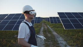 Old experienced engineer in VR headset experiencing virtual reality simulation touching digital interface on solar panel field. Modern technologies. - Powered by Shutterstock - Get 15% off with code: PIKWIZARD15