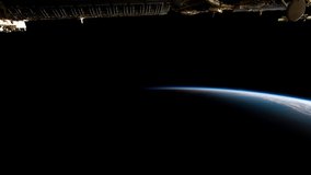 4K Time Lapse of the Earth sunrise to sunset seen from the International Space Station (ISS) with part of the station in frame completing one orbit around earth. Image courtesy of NASA.
