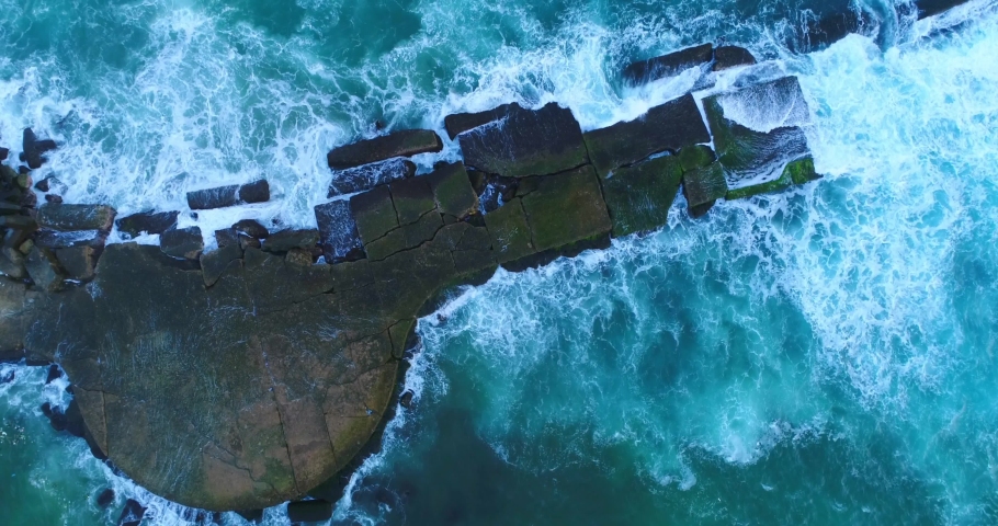 Aerial drone flight taking off in the wave breaker of Santo Domingo, Dominican Republic