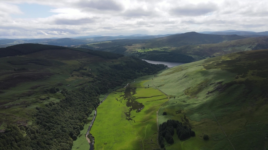 Aerial view over spectacular Wicklow Mountains and Lough Dan. A magnificent lake cradled amid mountains, with hiking trails and small sandy beaches. Ireland County Wicklow.