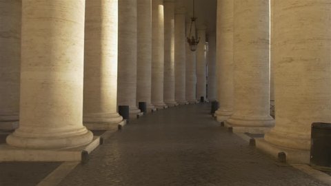 POV (first person point of view) flying sequence in the Vatican City (Rome, Italy) through the colonnades / pillars of St. Peter’s Square. 

Relevant to coronavirus, covid-19, sars-cov-2 corona virus.