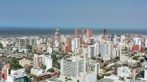 Barranquilla Atlantico in Colombia - Aerial drone view of city skyline moving forward.