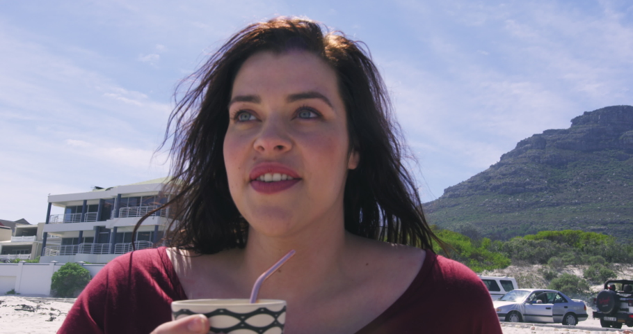 MS Two brunette women talking on beach / Cape Town, South Africa