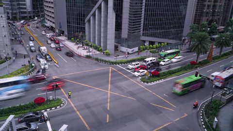 Cars Travelling At The Intersection Of Ayala Avenue In Makati City, Philippines. Busiest Roads In Makati Central Business District. - timelapse
