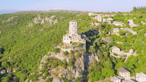 Significant extraordinary Pocitelj castle tower aerial wide shot