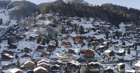 Aerial view of chalets and cottages on snowy mountain, Grimentz, Switzerland