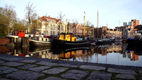 GRONINGEN - THE NETHERLANDS, December 19, 2019: Canal of the 'Noorderhaven' on a tranquil morning in the city of Groningen.
