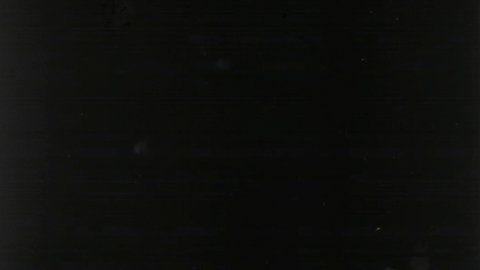 Writing, Old Film Leader with dust and scratches, Vintage Damaged Film Strip, Black Background