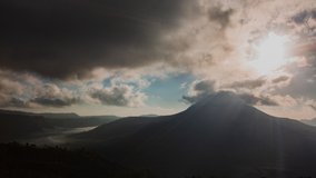 morning in kintamani. volcano Batur Bali Indonesiai. caldera view. unesco. Fast clouds moving. Timelapse hyperlapse 4K video.