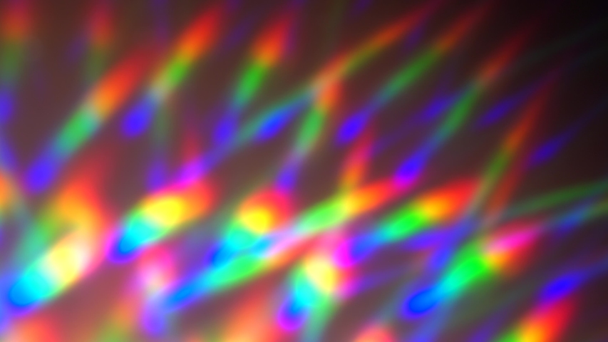 The neon lights crystal prism rainbow gradient. Holographic iridescent abstract background. Blue purple pink green color. Psychedelic movement | Shutterstock HD Video #1056461522