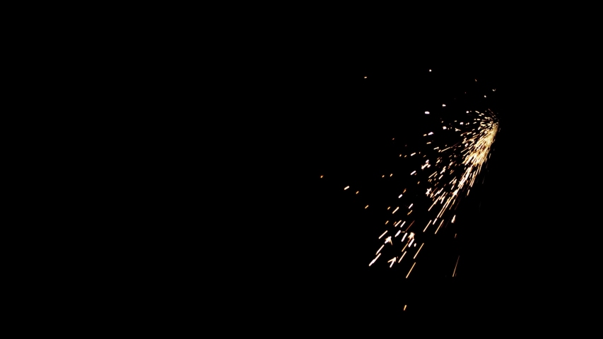 4K Sparks hits on Black Background, Sparks Over Black (ULTRA HD, UHD, 4K). Spark Wall created by Gun Powder Sparks Falling. Slow Motion. 