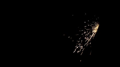 4K Sparks hits on Black Background, Sparks Over Black (ULTRA HD, UHD, 4K). Spark Wall created by Gun Powder Sparks Falling. Slow Motion. 