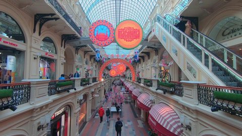 Moscow / Russia - 03 01 2020: Timelapse of shoppers walking around inside GUM Department Store.