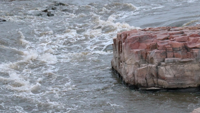 Turbulence and white water on Upper Sioux Falls on the Big Sioux River in South Dakota - Looping