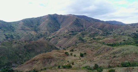 The big mountains and dry land terrain is the panorama of the Dominican Republic border with Haiti