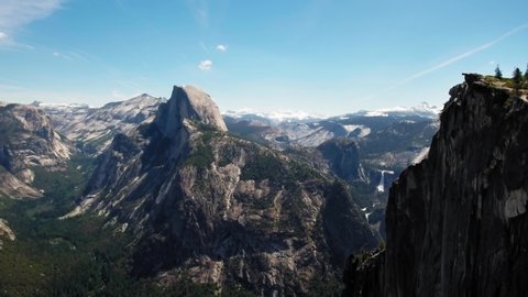 Aerial mountain landscape with waterfall from a bird's eye view at Glacier Point, Yosemite, California, USA