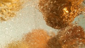 Juicy and healthy cold-press explosion. Refreshing natural juice splashing in extreme slow-motion. Beautiful and clear yummy juicing. Cold Press juicing in slow-motion. - Powered by Shutterstock - Get 15% off with code: PIKWIZARD15