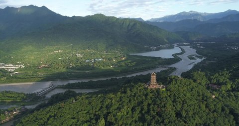  Aerial view of ancient irrigation system in Dujiangyan City Sichuan China river flowing from snow mountain into Chengdu plain
