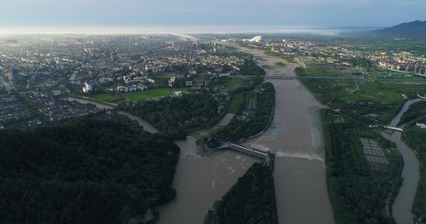  Aerial view of ancient irrigation system in Dujiangyan City Sichuan China minjiang river flowing from snow mountain through the city into Chengdu plain