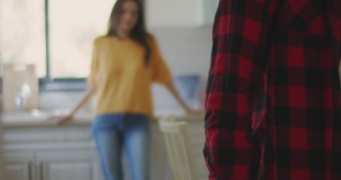 Couple at the kitchen at home, feeling desperate and upset after having a big fight. Breaking up, cheating, jealousy, divorce concept. Shallow DOF, Slow motion, BMPCC 4K
