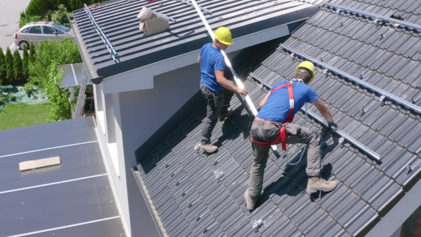 Real estate house construction roof installation workers at Slovenj Gradec Slovenia, an Industrial Video by BlackBoxGuild