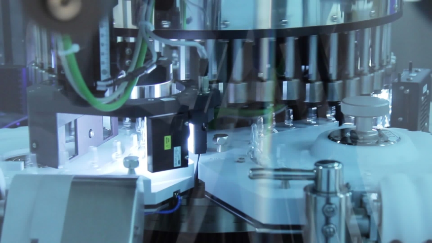 Pharmaceutical manufacturing equipment medicine ampoules control testing pharma manufacturing machinery medical vials manufacturing machinery modern pharmaceutical production technology | Shutterstock HD Video #1056535046
