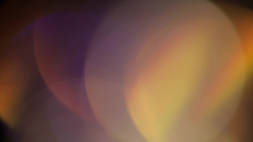 Light Leaks 4K footage. Lens glow flare bokeh overlays, burn flame background. For compositing over your footage, stylizing video, transitions. Defocused lamp flash rays effect. Light pulses and glow | Shutterstock HD Video #1056539132