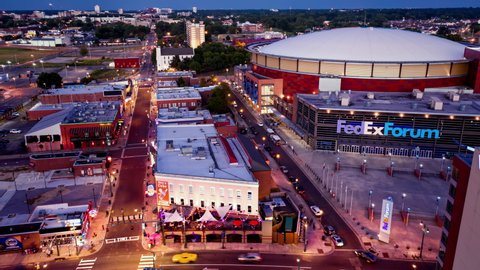 Memphis, Tennessee / USA - July  2020: People sightseeing on historic Beale Street in Memphis. Timelapse with motion blur of people walking, no identifiable faces. Aerial drone footage.