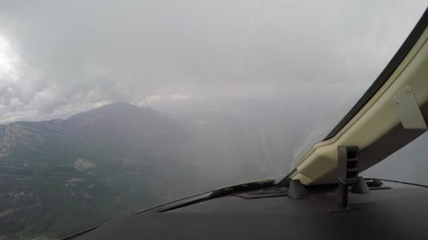 Rain on Aircraft Windshield during Flight, Pilot Point of View.