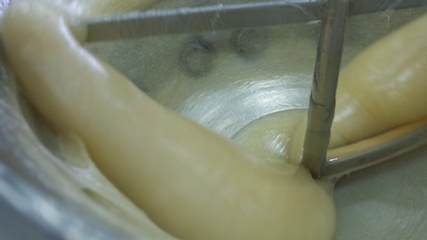 View inside a mixing vat as almonds are being added to a batch of Turkish Delight.