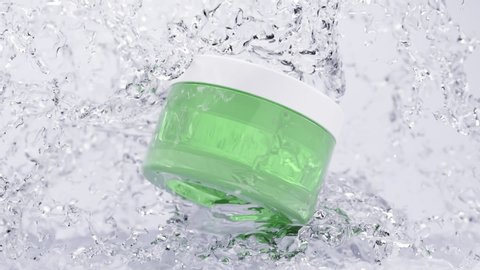 Cosmetic plastic green jar with transparent moisturizing cream and white lid in frozen water. Glass packaging in drops of water, jet of ice, cool, snow. Realistic layout of packaging 3d animation.